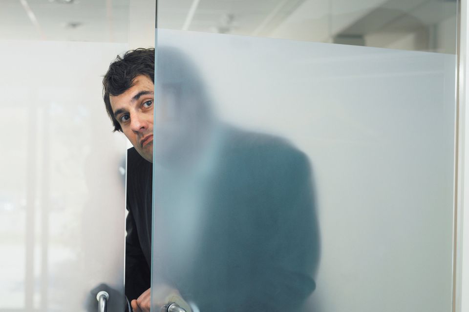 A staff member is sneaking off to do nixers on company time. Photo: Getty